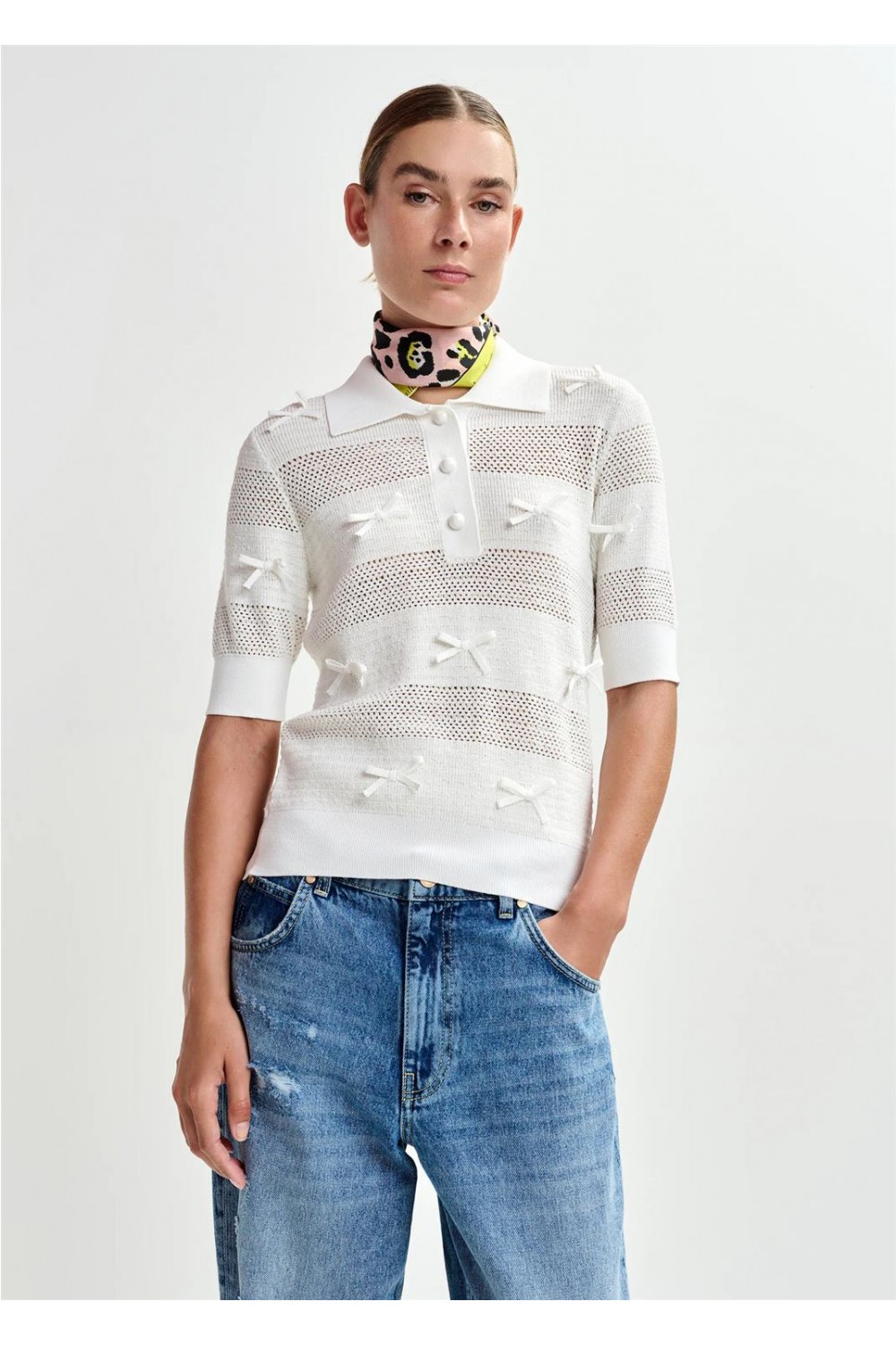 Polo de punto de mujer...