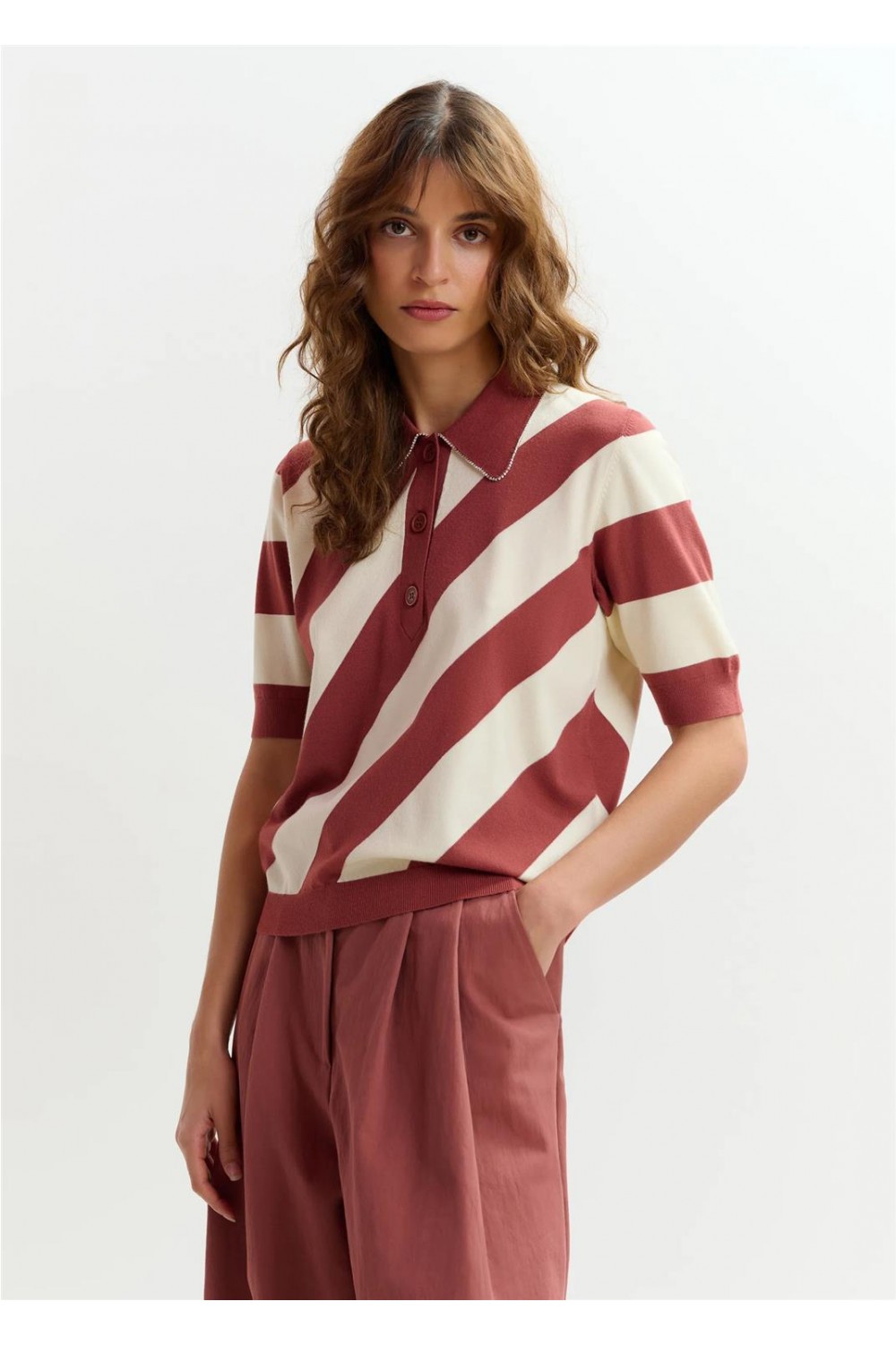 Polo de punto de mujer...